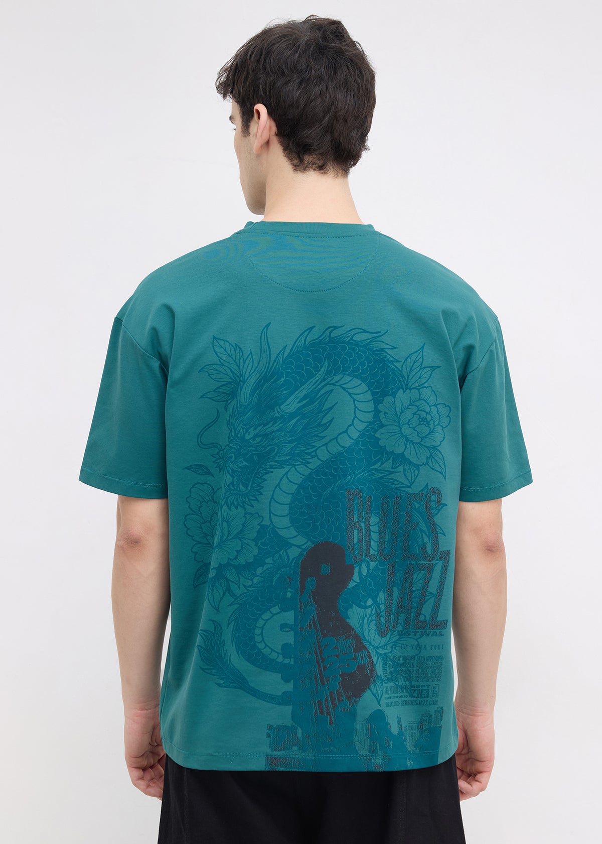 Geruge Tonal Graphic Oversized T-shirt: Bottle Green